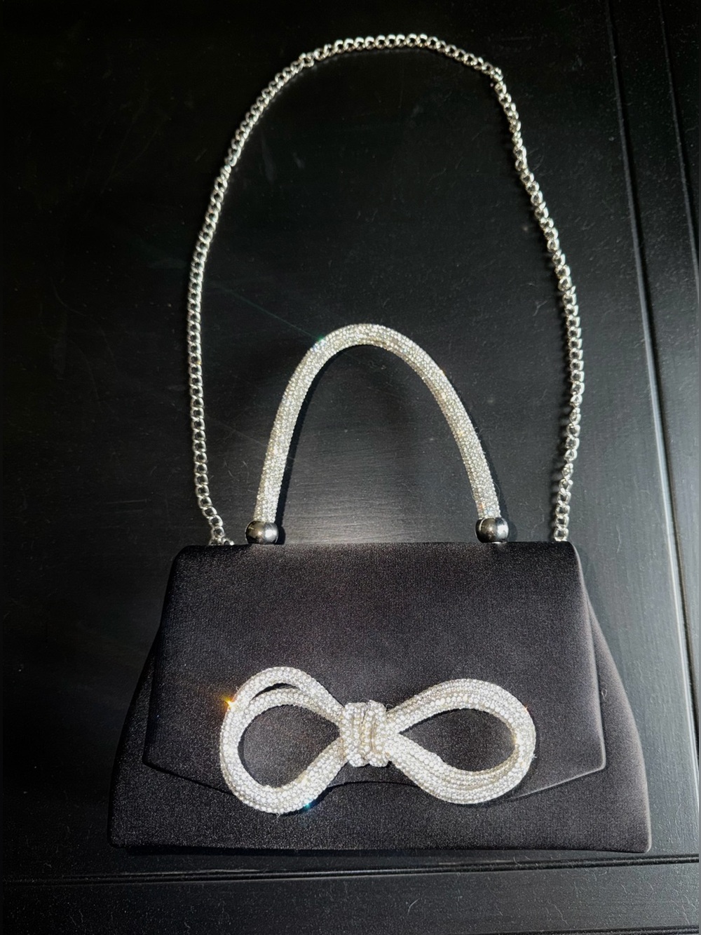 Boutique black satin handbag with rhinestone detail and a removable chain strap